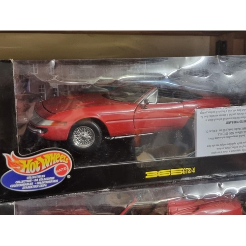 75 - Burago: four boxed Hot Wheels Ferrari models, comprising: 360 Spider; 365GTB; 365GTS and F355 S... 