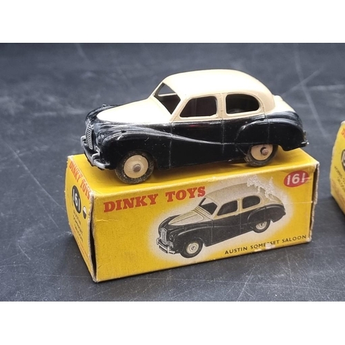 83 - Dinky: three vintage boxed vehicles, comprising: Morris Oxford Saloon No.159; Studebaker Land C... 