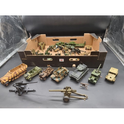 87 - Dinky: a collection of Dinky military vehicles and artillery.