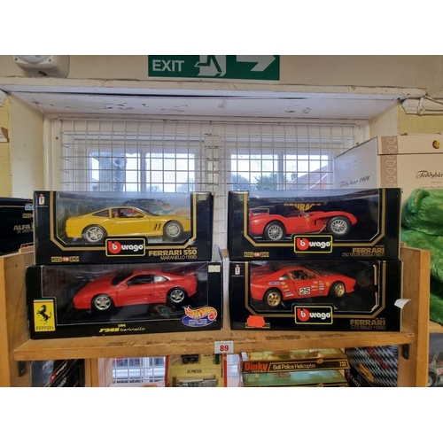 89 - Burago: four boxed Ferrari models, to include a yellow Limited Edition No.3064.... 