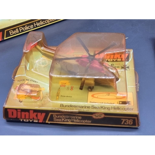 90 - Dinky: a vintage Dinky Sea King; together with 3 other helicopters; and a Dinky race car kit, a... 