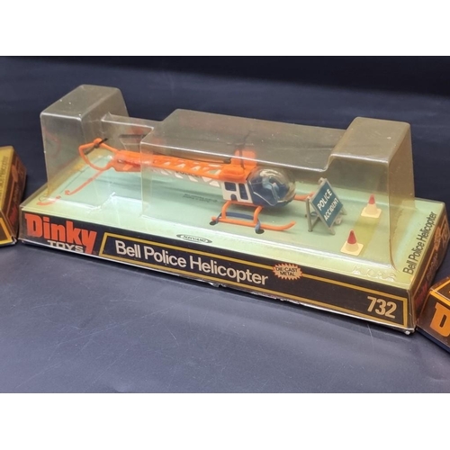 90 - Dinky: a vintage Dinky Sea King; together with 3 other helicopters; and a Dinky race car kit, a... 