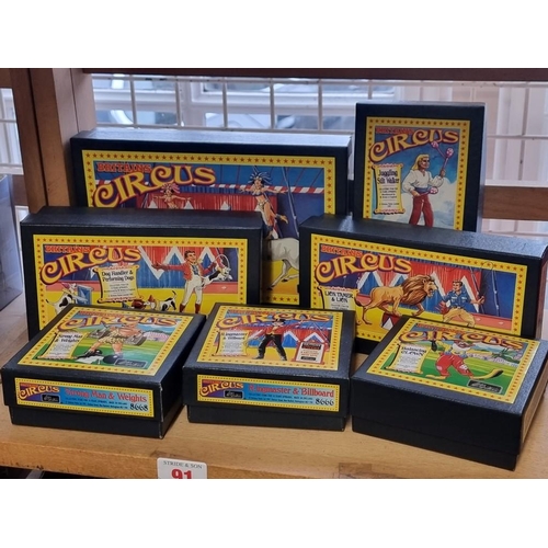 91 - Britains Circus: seven boxed diecast figures, a complete set to include ringmaster.