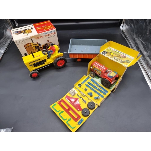 92 - Tinplate: a vintage Japanese Marusan Tractor construction kit in box (1950s); together with a T... 