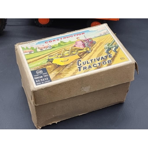 92 - Tinplate: a vintage Japanese Marusan Tractor construction kit in box (1950s); together with a T... 