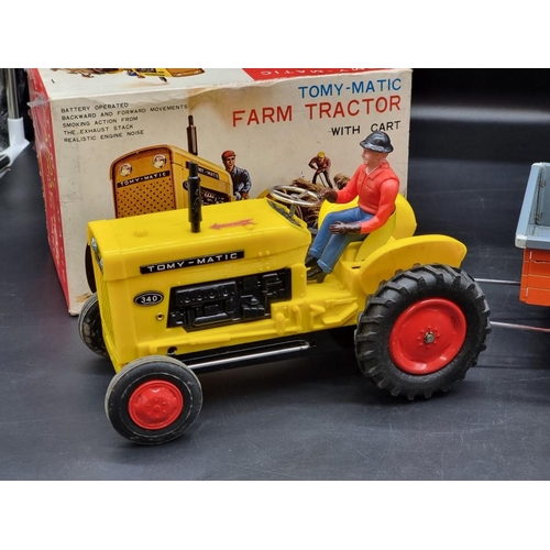 92 - Tinplate: a vintage Japanese Marusan Tractor construction kit in box (1950s); together with a T... 