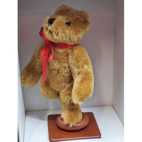 97 - Merrythought: a Limited Edition musical teddy bear, 128/1000, in box. 