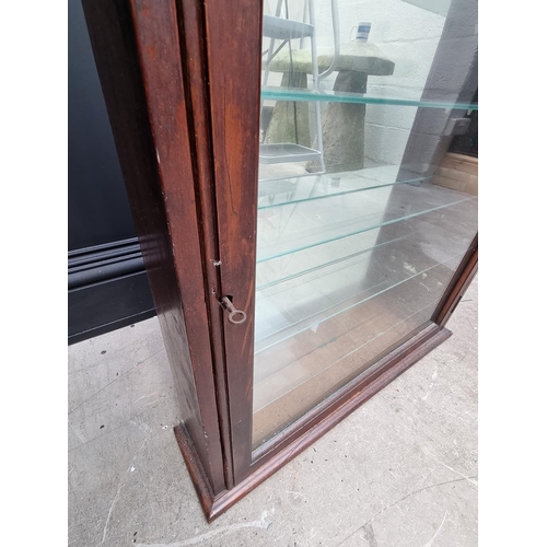 1037 - An early 20th century mahogany hanging display cabinet, with mirrored back, 76cm high x 67.5cm wide ... 