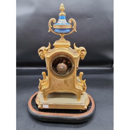 1566 - A late 19th century Louis XVI style, gilt metal and Sevres mounted mantel clock, 36cm high, with pen... 