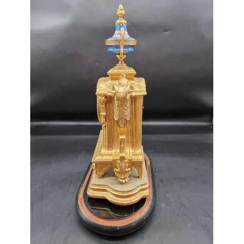 1566 - A late 19th century Louis XVI style, gilt metal and Sevres mounted mantel clock, 36cm high, with pen... 