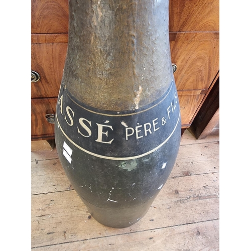 1568 - Advertising: an oversized Masse Champagne plaster display bottle, with painted decoration, 99cm high... 