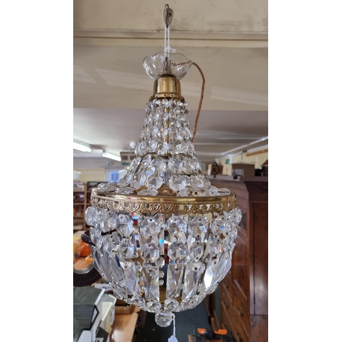 1590 - A brass and faceted glass bead chandelier, 48cm high. 