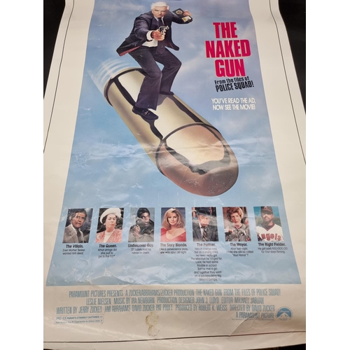 1594 - Movie Posters: a collection, to include Jaws, 101.5 x 68.5cm. (9) 