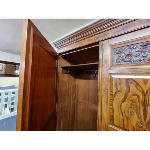 1017 - A good late Victorian figured walnut bedroom suite, comprising: a compactum style wardrobe, 195.5cm ... 