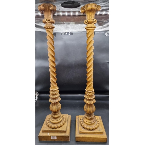 1025 - A large and impressive pair of carved giltwood lamp stands, (formally electrified), 88cm high.... 