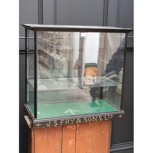 1032 - Advertising: a 'J.S. Fry & Sons, Ltd' ebonized display case, 65cm high x 71cm wide x 36.5cm deep... 