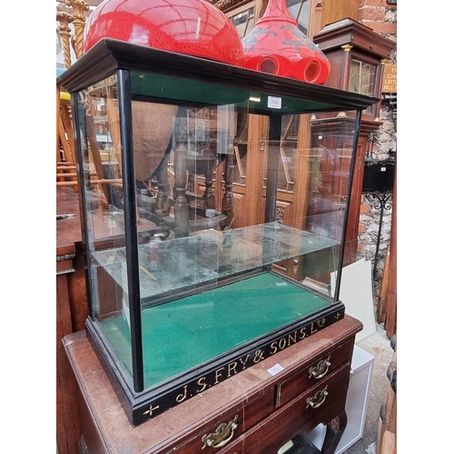 1032 - Advertising: a 'J.S. Fry & Sons, Ltd' ebonized display case, 65cm high x 71cm wide x 36.5cm deep... 