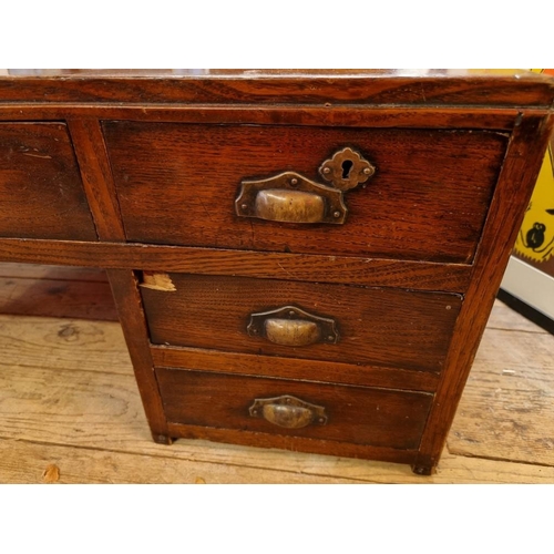 1042 - An Oriental elm low table, 35cm high x 90.01cm wide. 