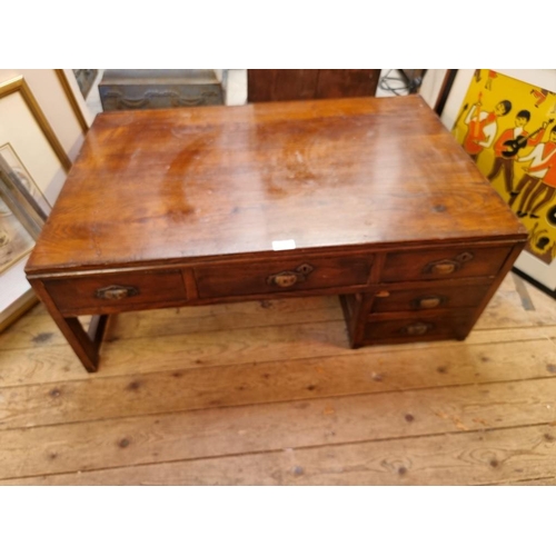 1042 - An Oriental elm low table, 35cm high x 90.01cm wide. 