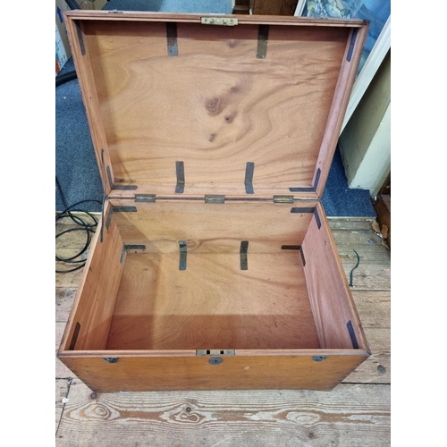 1043 - A graduated pair of antique camphor wood coffers, largest 39.5cm high x 69cm wide x 48cm deep. (2)... 