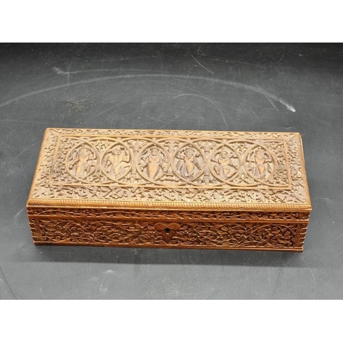 1062 - WITHDRAWN FROM SALE: An eastern carved hardwood rectangular casket, 30.5cm wide.