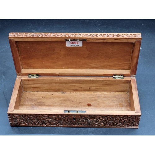 1062 - WITHDRAWN FROM SALE: An eastern carved hardwood rectangular casket, 30.5cm wide.