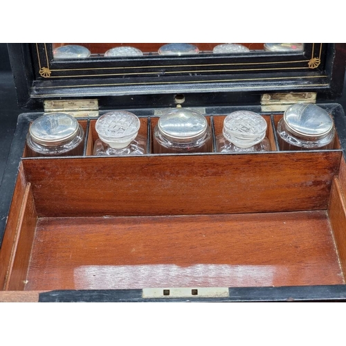 1063 - A Victorian burr walnut toilet box, with electroplated fittings, 31cm wide. 