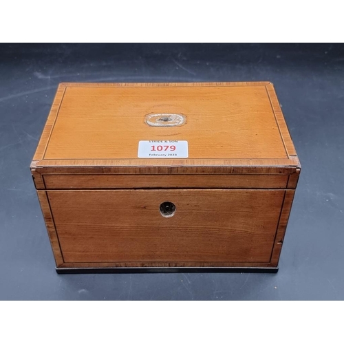 1079 - A George III satinwood and kingwood crossbanded tea caddy, 20cm wide.