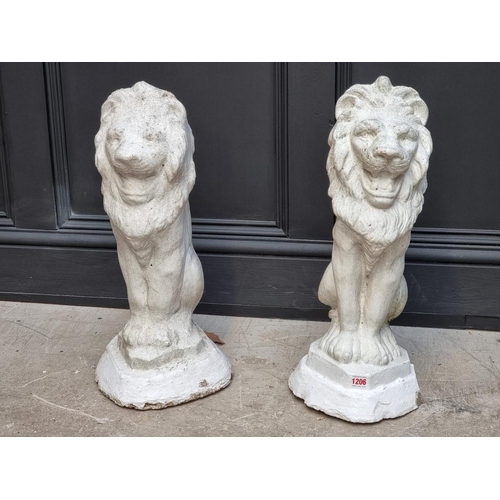 1206 - A pair of white painted composition stone lion gate pier finials, 56cm high.