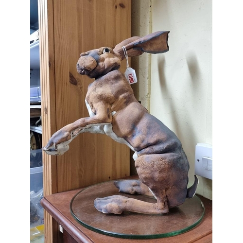 1390 - Studio Pottery: an Elaine Peto lifesize ceramic hare, 45.5cm high.  