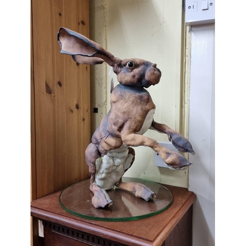 1390 - Studio Pottery: an Elaine Peto lifesize ceramic hare, 45.5cm high.  