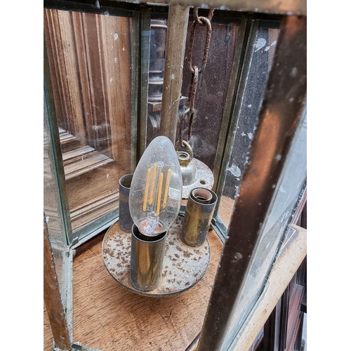 1194 - A set of three brass hexagonal ceiling lanterns, 40cm high.