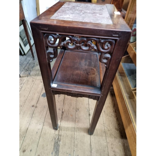 1061 - A Chinese carved hardwood and marble top jardiniere stand or table, 42cm wide. ... 