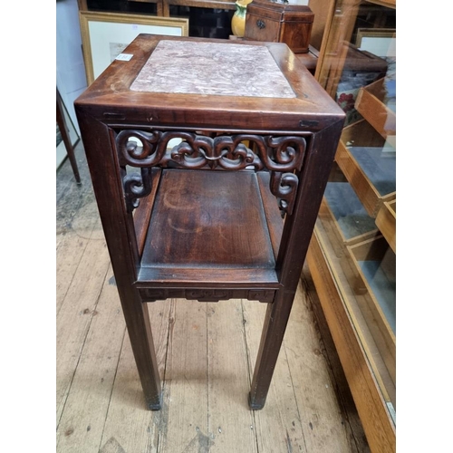 1061 - A Chinese carved hardwood and marble top jardiniere stand or table, 42cm wide. ... 