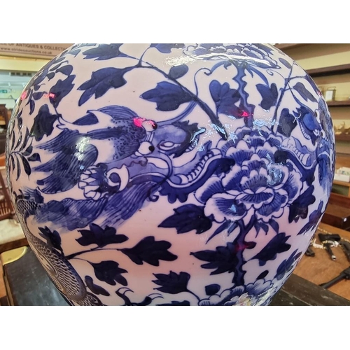 1409 - A large Chinese blue and white inverted baluster jar, painted with dragons, 19th century, Qianlang f... 