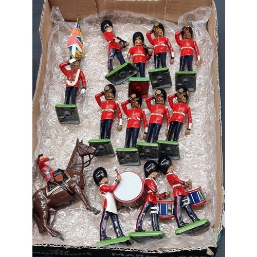 60A - Britains: a group of twelve musicians from the Guards Regiment; together with Queen Elizabeth II, on... 