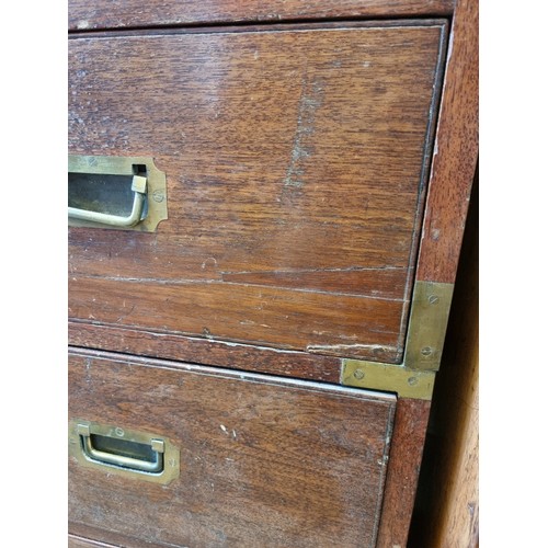 1077 - An antique teak and brass bound campaign chest, labelled 'Manufactured by S W Silver & Co,...Lon... 