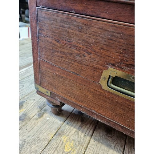 1077 - An antique teak and brass bound campaign chest, labelled 'Manufactured by S W Silver & Co,...Lon... 