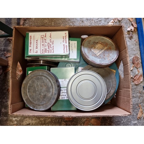 1635 - A large quantity of 16mm film reels, in tins. (4 boxes). Please note only 4 boxes not 8 as previousl... 