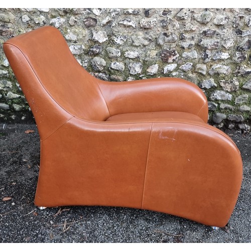 1152 - A modern leatherette chair and stool, (surface wear).