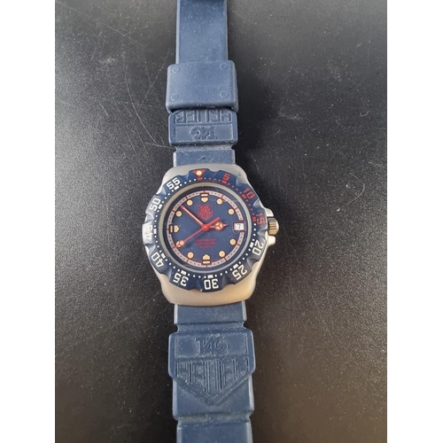 520 - A 1980s TAG Heuer Formula 1 Professional quartz wristwatch, 35mm, Ref. WA1210, on blue silicone... 