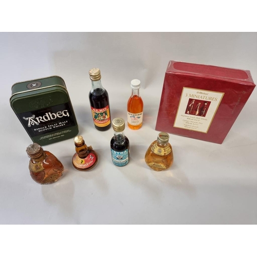 10 - Two 5cl miniature bottles of Ardbeg whisky, comprising: 17 year old and 10 year old, in one tin; tog... 