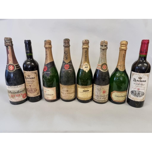 104 - A mixed group of wine and champagne, to include two old bottles of Moet & Chandon NV. (8)... 