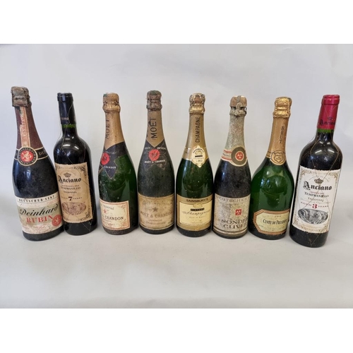 104 - A mixed group of wine and champagne, to include two old bottles of Moet & Chandon NV. (8)... 