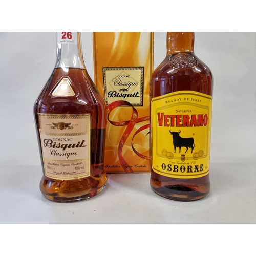 26 - Two 1 litre bottles of brandy, comprising: Bisquit Classique cognac, in oc; and Osborne Veterano bra... 