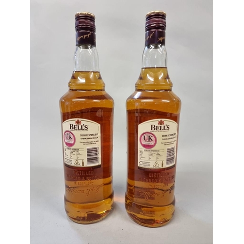 32 - Two 1 litre bottles of Bell's blended whisky. (2)