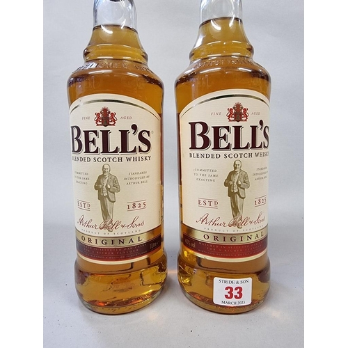 33 - Two 1 litre bottles of Bell's blended whisky. (2)