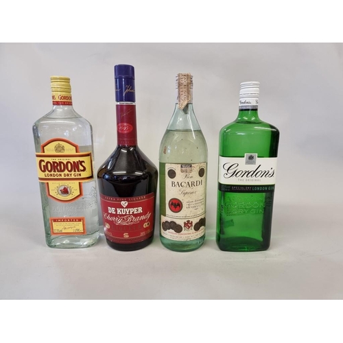 88 - Four bottles of spirits, comprising: a 1 litre De Kuyper cherry brandy; a bottle of Bacardi white ru... 