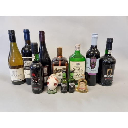 94 - A mixed group of alcohol, to include: three Berry Bros & Rudd bottles; a 1 litre bottle of Coint... 