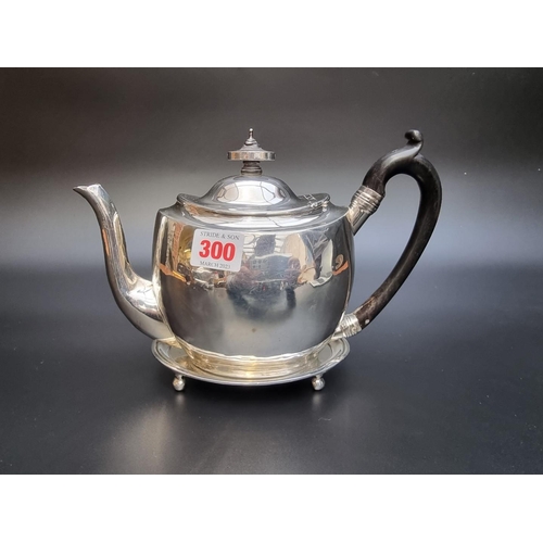 300 - A George III silver teapot and matching stand, London 1805, 526g.